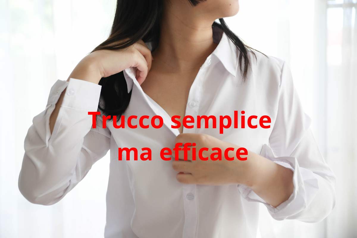 donna in camicia e scritta
