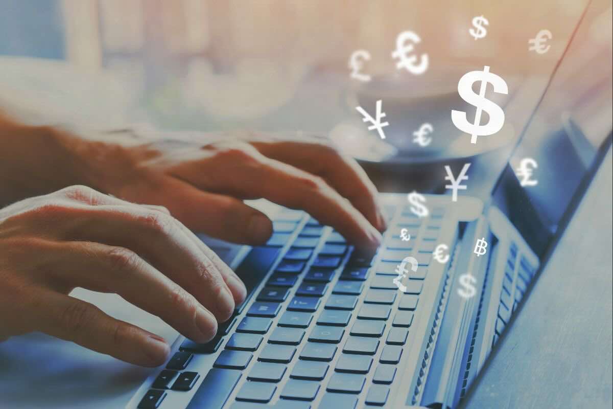 Battere tastiera PC, icone di valute diverse
